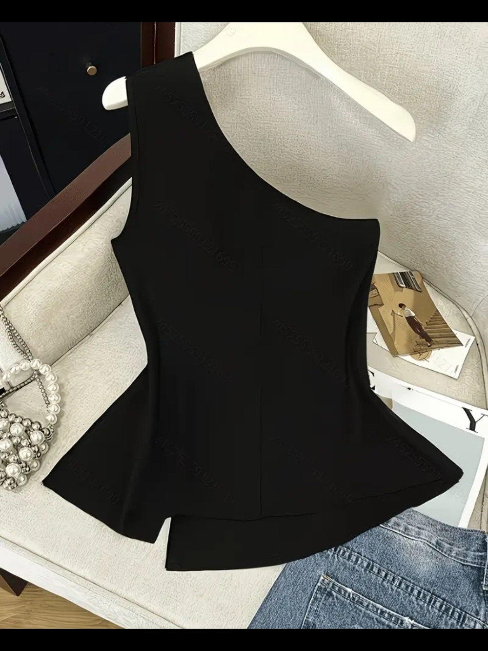 Sleeveless One-Shoulder Black Peplum Top